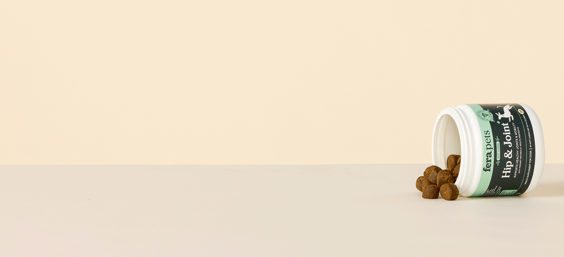 Animated image of Fera Pets Soft Chews spilling out of a sideways container on a beige background 