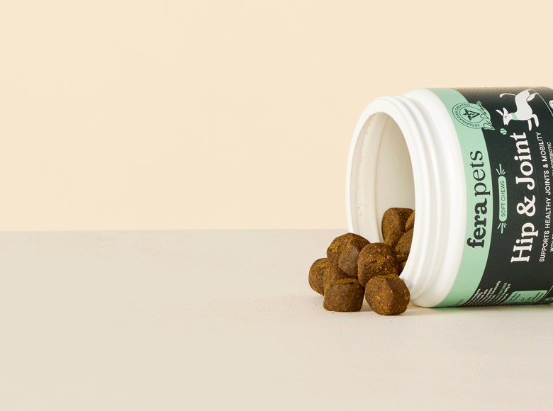 Animated image of Fera Pets Soft Chews spilling out of a sideways container on a beige background 