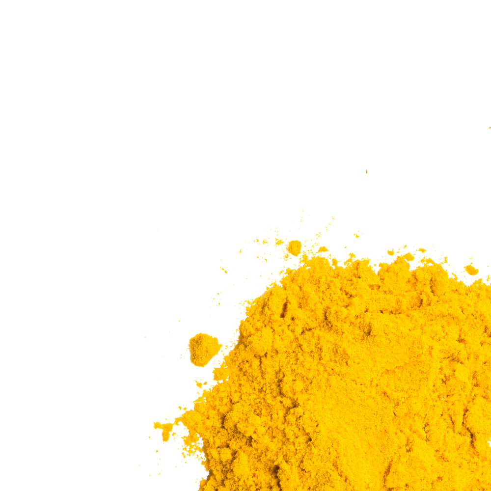 Close-up of yellow powder on a white background