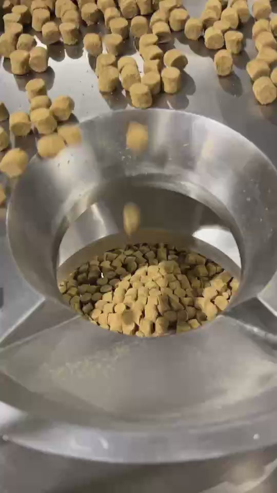 Soft chew dog supplements are shown going through the production process 